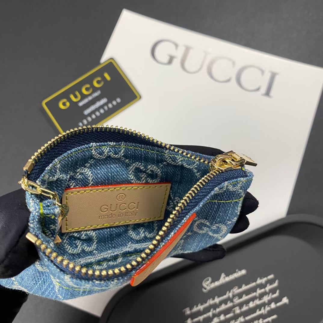 Collezione portachiavi con monogramma GG in denim e fermagli dorati