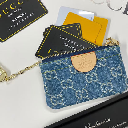 Collezione portachiavi con monogramma GG in denim e fermagli dorati