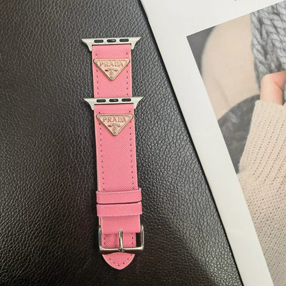 Cinturino in pelle per Apple Watch con etichetta monogramma a doppio triangolo